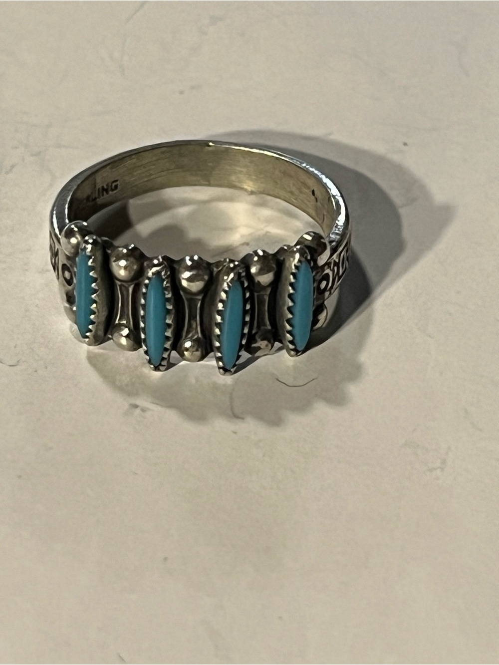 Sterling Silver Turquoise Ring. Signed. Detailed band. Sz. 5. Southwestern